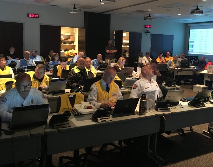 Image showing emergency management team in conference room